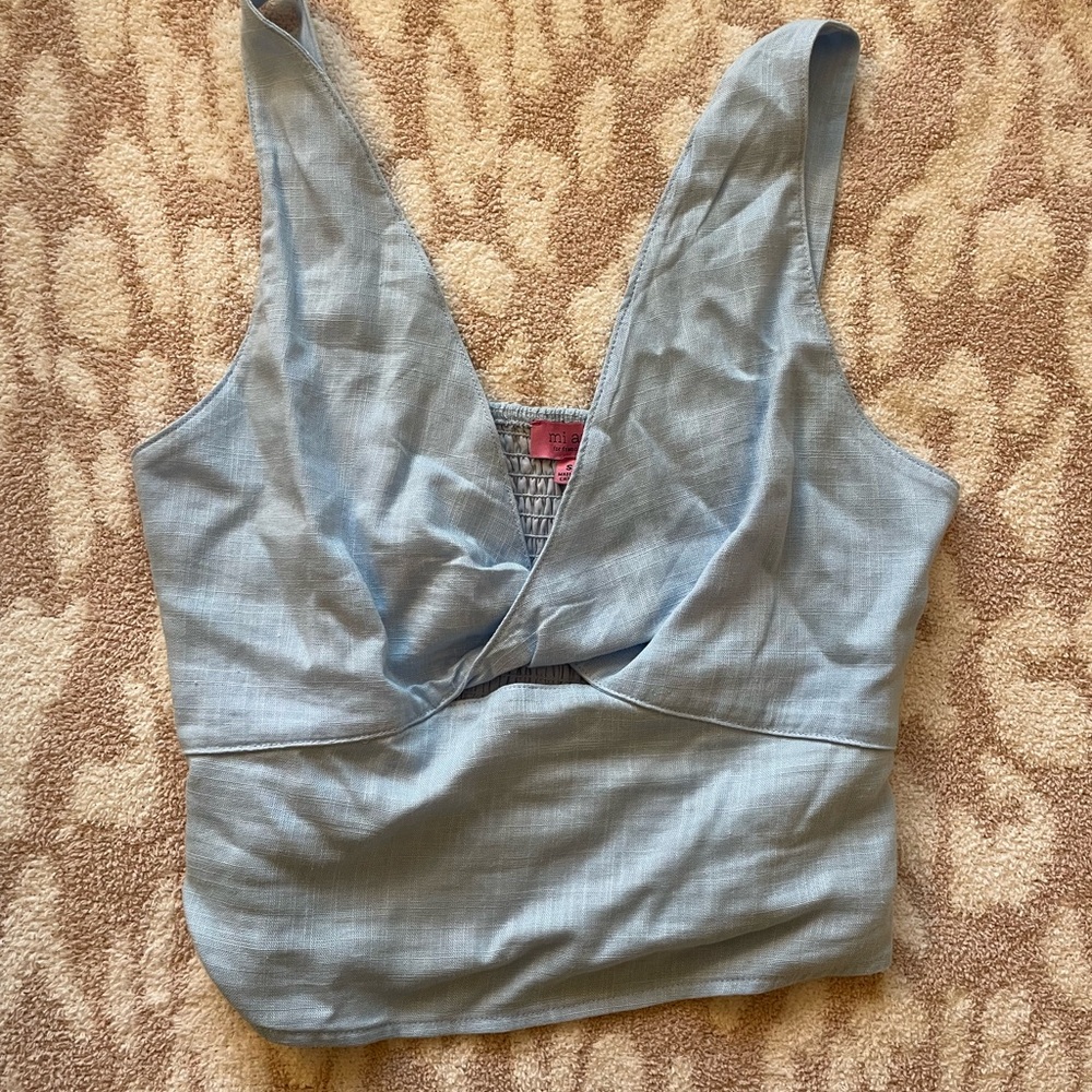 Francesca’s Light Blue Front Twist Top